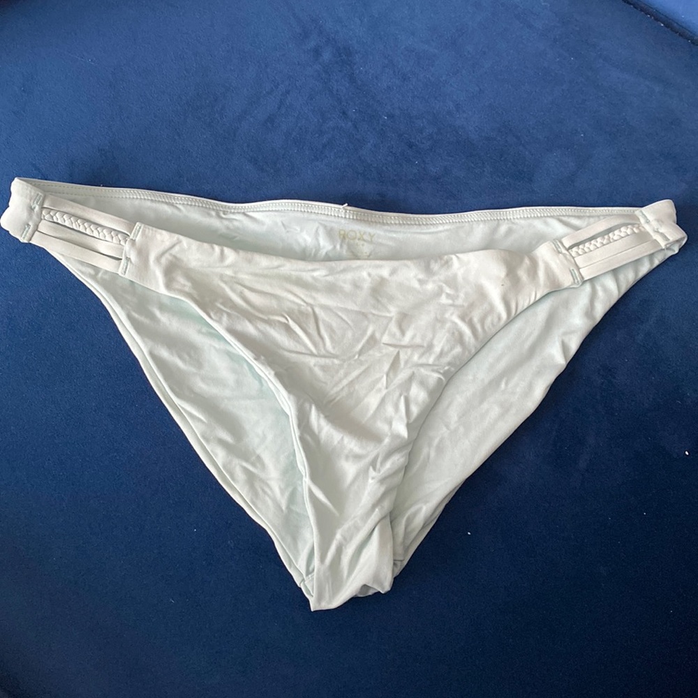 Light blue Roxy bikini bottom with braided sides.